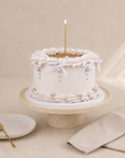 Golden Crown Torte von Batida - Torte mit Creme-Rüschen und Schleife