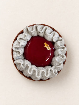 Black Sesame Tartlet by Batida - cocoa shortcrust tart, feuilletine and black sesame ganache