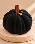 Pumpkin Latte Black black pumpkin with a gold leaf flake, close-up